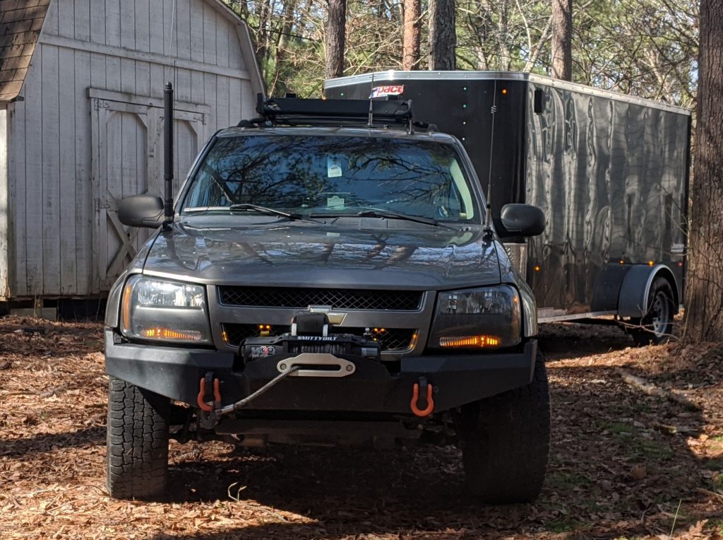 My off-road vehicle with HF and VHF/UHF antennas mounted to the hood for Amateur Radio off-road communications.