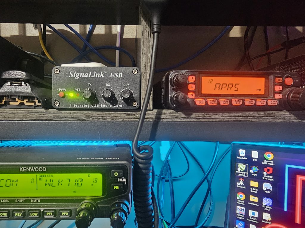 SignaLink connected to a Yaesu 7900, above a Kenwood TM-V71, used for packet radio for message relays